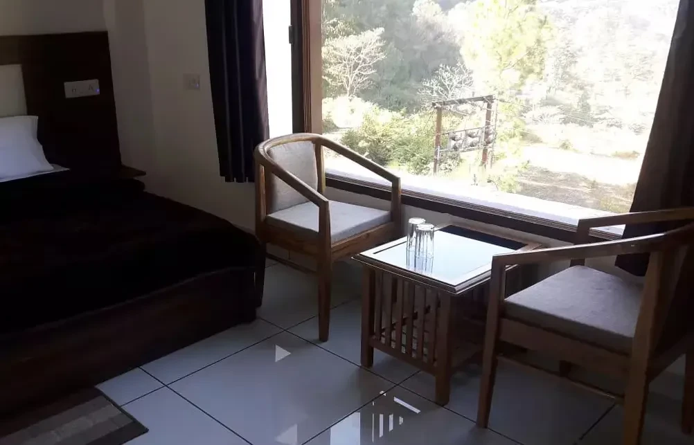 Tulip Resort Rudraprayag [Room With A Seating Area]